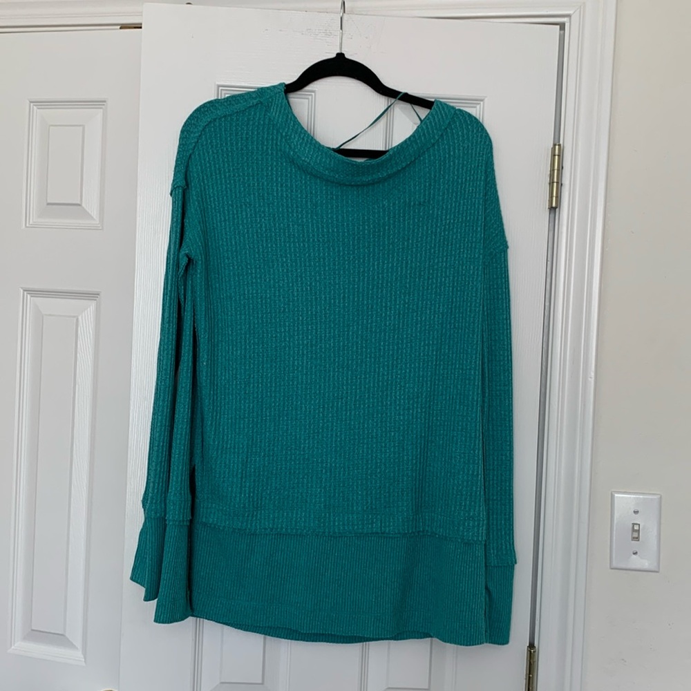 Free people sweater seams are on outside